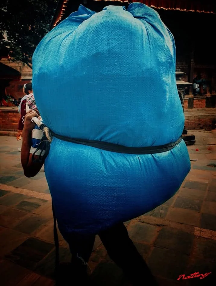 NottingW Photography — man with the heavy load
